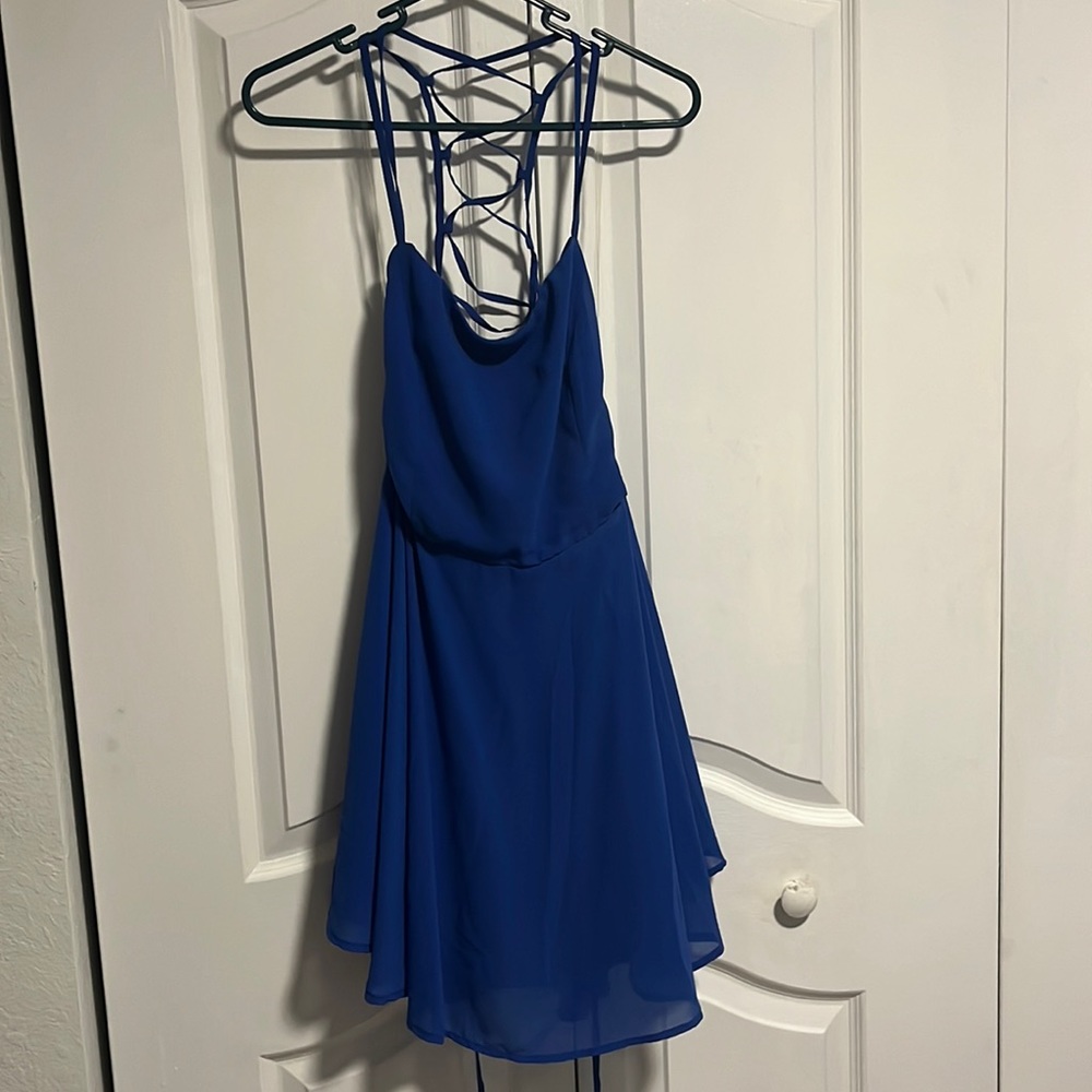 Blue cocktail dress with straps in the back